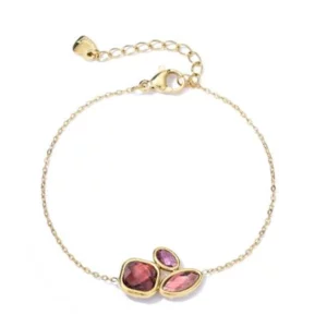 Goudkleurige armband Rosalie met drie roze stenen in verschillende vormen, een fijn schakelkettinkje en een verlengketting